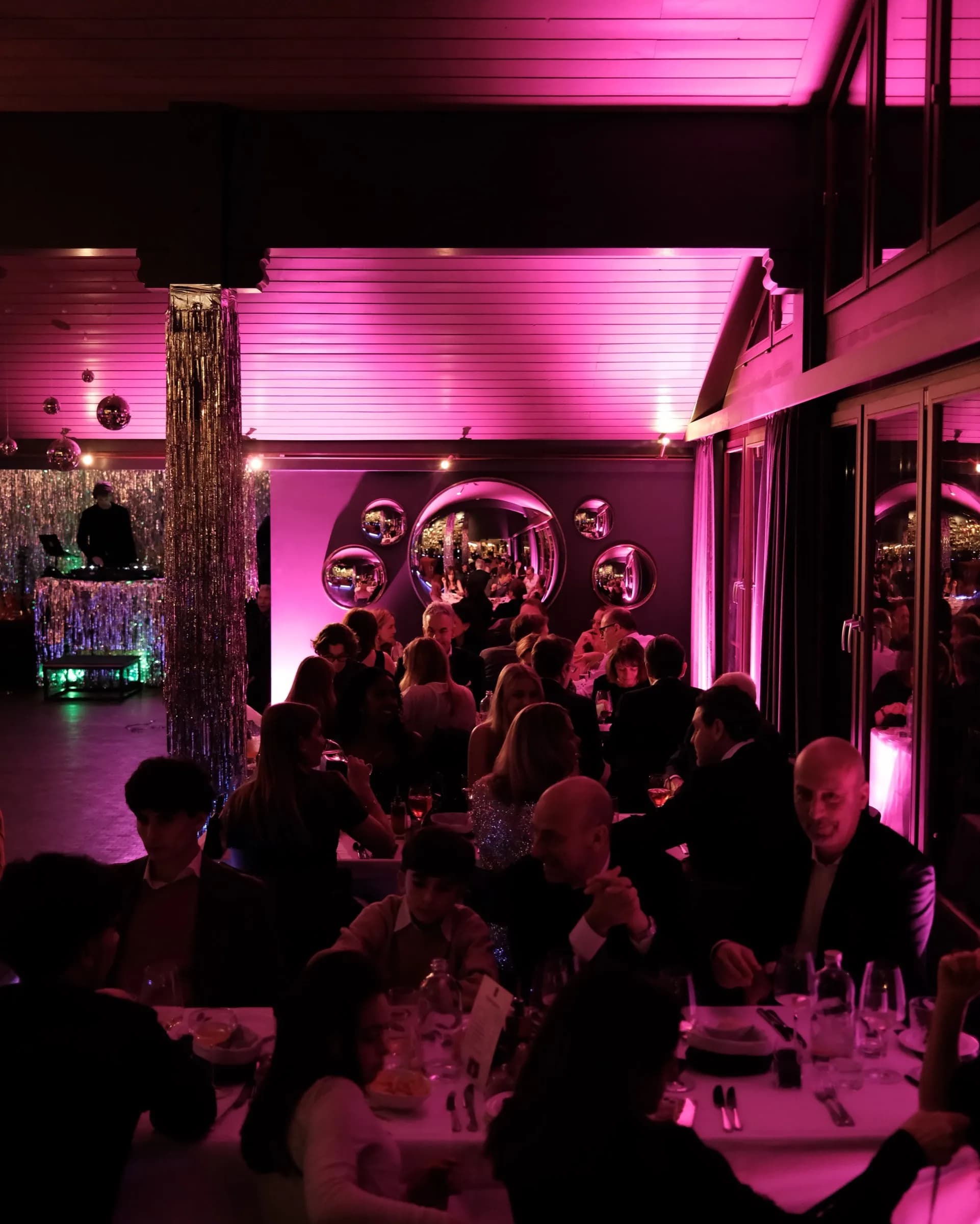 Club event with pink lighting
