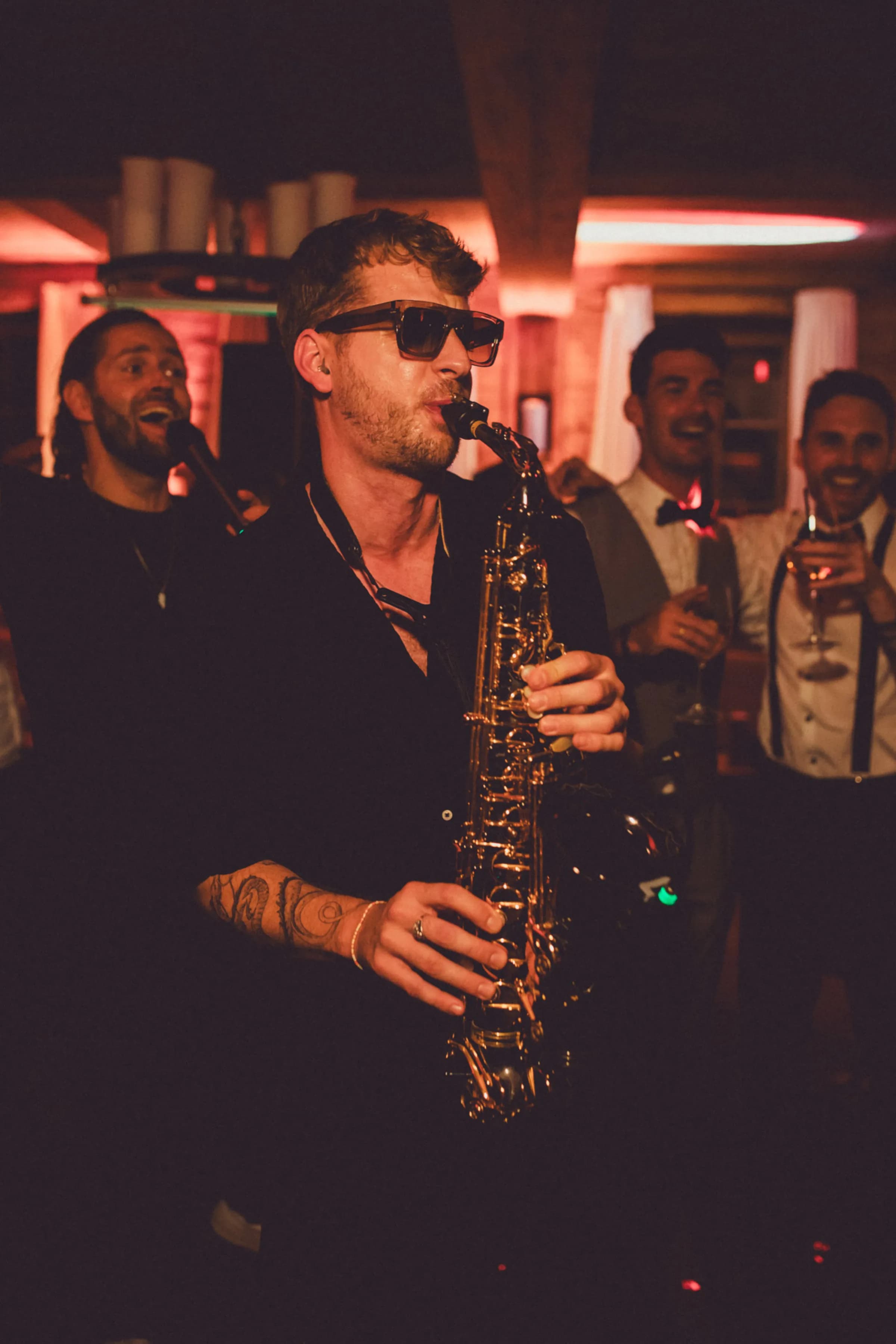 Pascal playing saxophone at the evening party